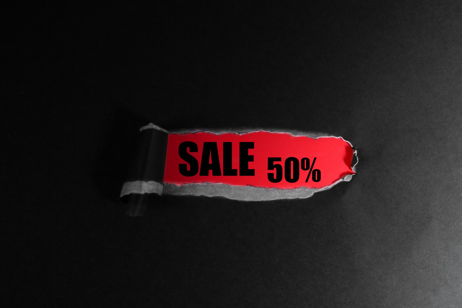 Red sale tag indicating a discount price